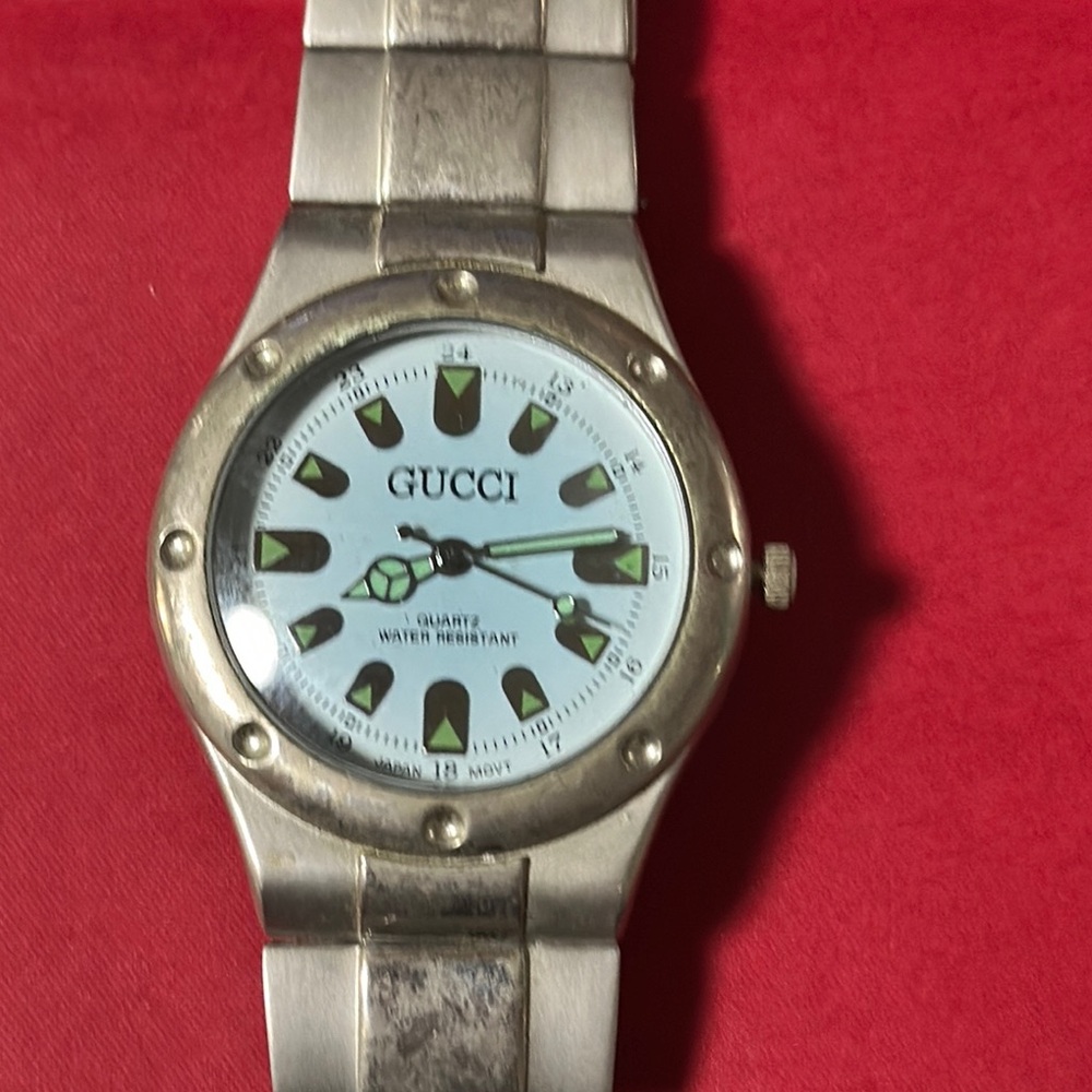 Silver Watch with Green Accents